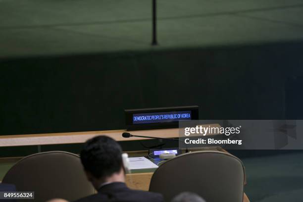 The Democratic People's Republic of Korea seat sits empty while U.S. President Donald Trump, not pictured, speaks during the UN General Assembly...