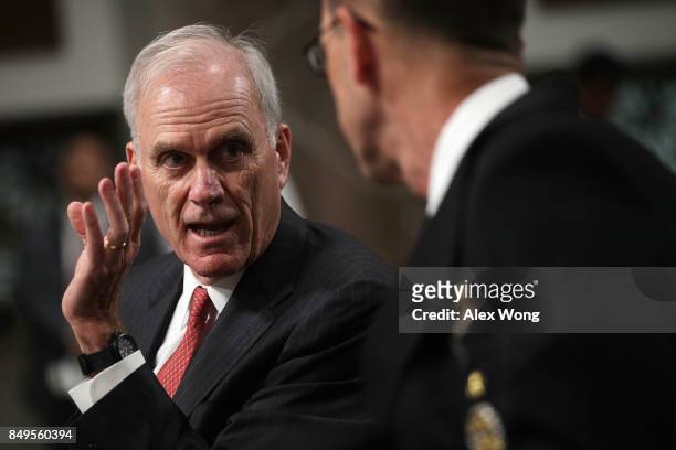 Secretary of the Navy Richard Spencer talks to Chief of Naval Operations Adm. John Richardson prior to a hearing before Senate Armed Services...