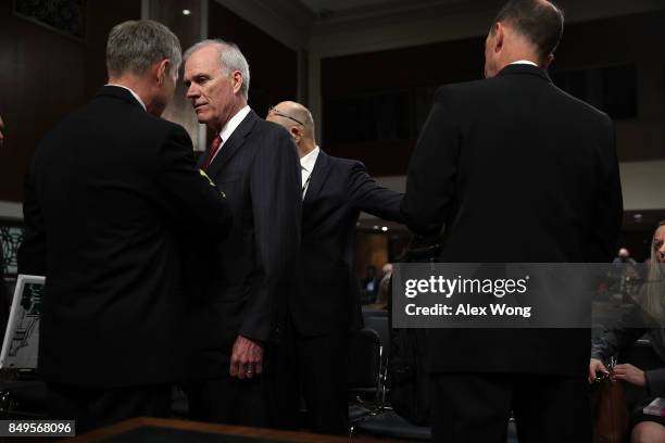 Secretary of the Navy Richard Spencer listens to an aide prior to a hearing before Senate Armed Services Committee September 19, 2017 on Capitol Hill...