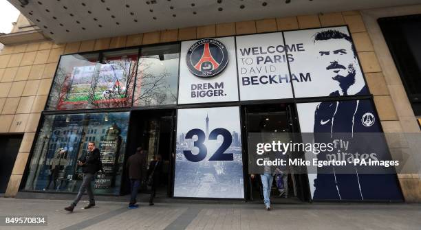 David Beckham signs hang outside the Paris Saint-Germain Club shop on The Champs-Elysees, Paris reading 'Welcome To Paris'