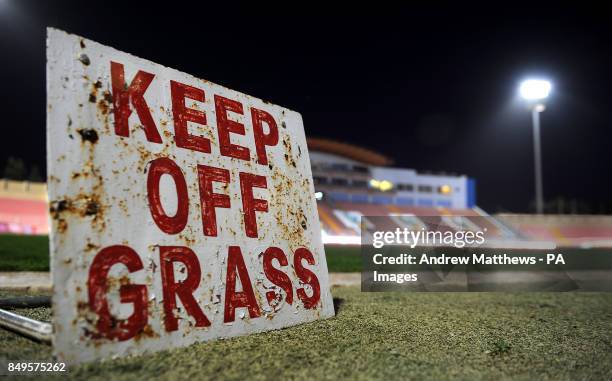 General view of a Keep Off Grass sign at the Ta' Qali National Stadium in Malta