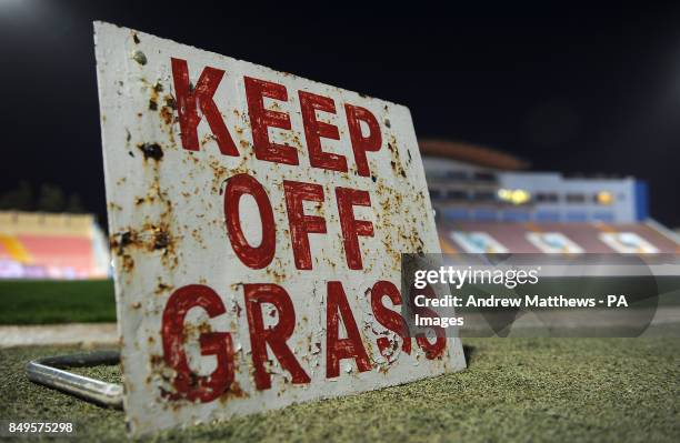 General view of a Keep Off Grass sign at the Ta' Qali National Stadium in Malta