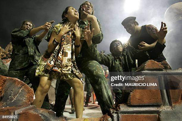 Revellers of Tom Maior samba school parade atop of a float at the Sambadrome, as part of Carnival celebrations, in Sao Paulo, Brazil early February...