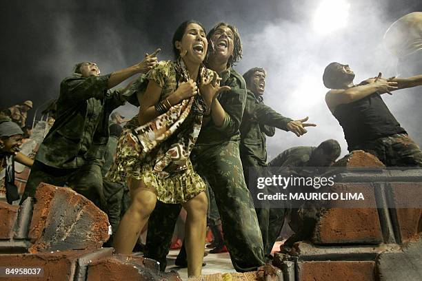 Revellers of Tom Maior samba school parade atop of a float at the Sambadrome, as part of Carnival celebrations, in Sao Paulo, Brazil early February...