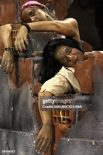 Revellers of Tom Maior samba school parade atop of a float at the Sambadrome, as part of Carnival celebrations, in Sao Paulo, Brazil early February...