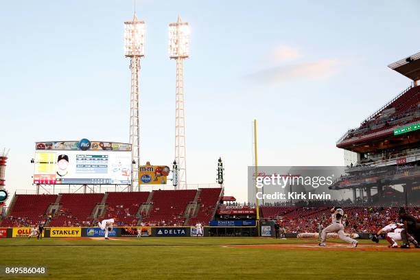 Michael Lorenzen of the Cincinnati Reds throws a pitch to David Freese of the Pittsburgh Pirates during the game at Great American Ball Park on...