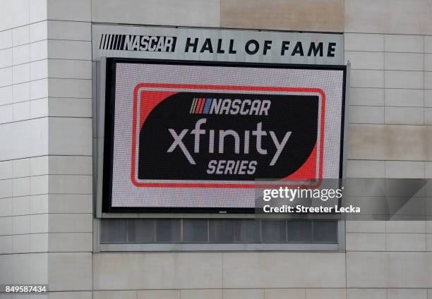 New series logo is unveiled on a screen at the NASCAR Hall of Fame during the NASCAR XFINITY Series Playoffs Media Day at Embassy Suites Charlotte...