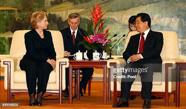 Secretary of State Hillary Clinton meets Chinese President Hu Jintao on at the Great Hall Of The People February 21, 2009 in Beijing, China. Clinton...