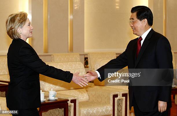 Secretary of State Hillary Clinton meets Chinese President Hu Jintao on at the Great Hall Of The People February 21, 2009 in Beijing, China. Clinton...