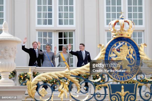 King Willem-Alexander, Queen Maxima, Princess Laurentien and Prince Constantijn wave at the balcony of Palace Noordeinde during the Prinsjesdag on...