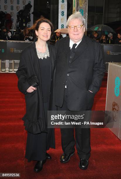 Sir Alan Parker and Lisa Parker arriving for the 2013 British Academy Film Awards at the Royal Opera House, Bow Street, London.