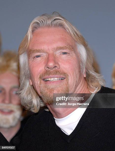 Sir Richard Branson poses for pictures as he launches global competition to find the best 'Sir Richard lookalikes', part of Virgin Atlantic's 25th...