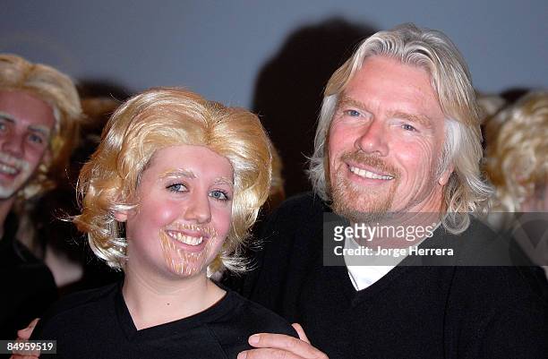 Sir Richard Branson poses for pictures as he launches global competition to find the best 'Sir Richard lookalikes', part of Virgin Atlantic's 25th...