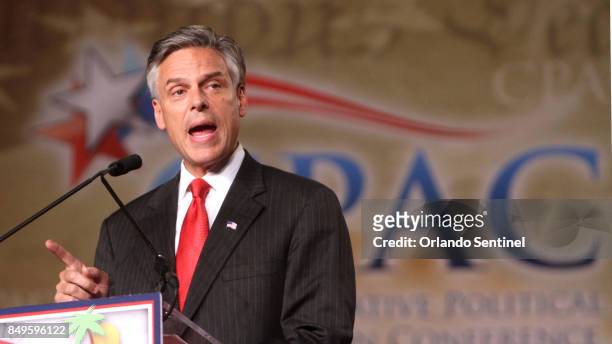 Jon Huntsman addresses the Conservative Political Action Conference at the Orange County Convention Center in Orlando, Fla., in a September 23 file...