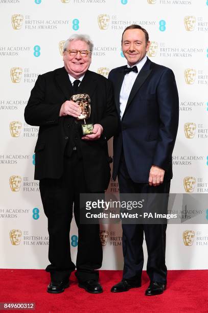 Sir Allan Parker and Kevin Spacey in the press room at the 2013 British Academy Film Awards at the Royal Opera House, Bow Street, London.