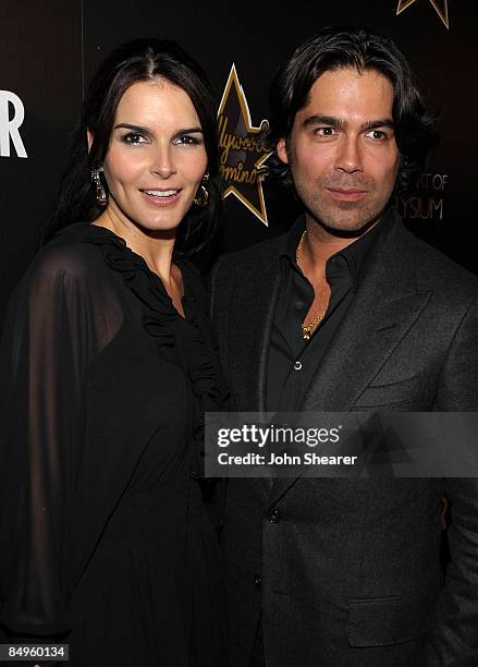 Actress Angie Harmon and designer Brian Atwood arrive at the Bally and Vanity Fair Hollywood Domino Game Night benefiting The Art of Elysium held at...