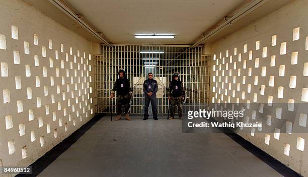 Prison security personnel stand guard at the newly opened Baghdad Central Prison in Abu Ghraib on February 21, 2009 in Baghdad, Iraq. The Iraqi...