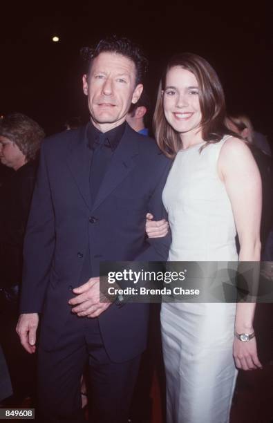 Los Angeles, CA. Lyle Lovett with April Kimble at the premiere of his new movie, "Cookie's Fortune." Photo by Brenda Chase/Online USA, Inc.