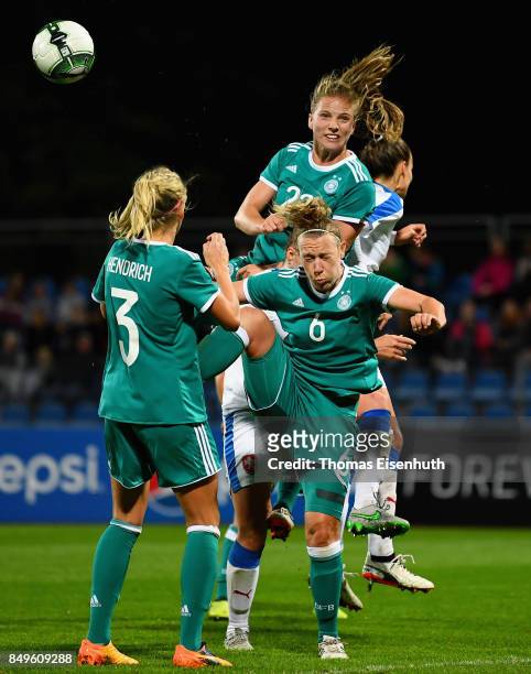 Kathrin Hendrich , Kristin Demann and Tabea Kemme of Germany and Lucie Vonkova of the Czech Republic vie for the ball during the 2019 FIFA Women's...