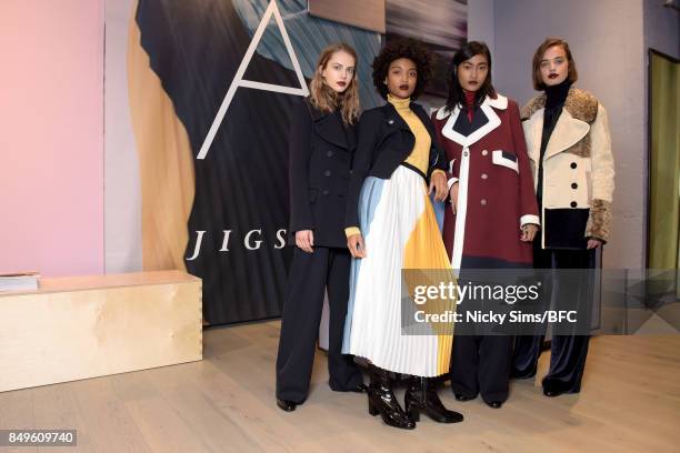 Models showcases designs at the A By Jigsaw presentation during London Fashion Week September 2017 on September 19, 2017 in London, England.