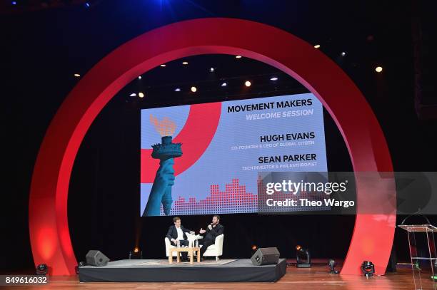 Co-Founder and CEO of Global Citizen and Global Poverty Project Hugh Evans and entrepreneur and philanthropis Sean Parker speak onstage during Global...