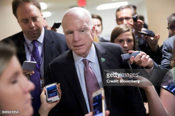 Senator John McCain, a Republican from Arizona and chairman of the Senate Armed Services Committee, speaks to members of the media in the basement of...