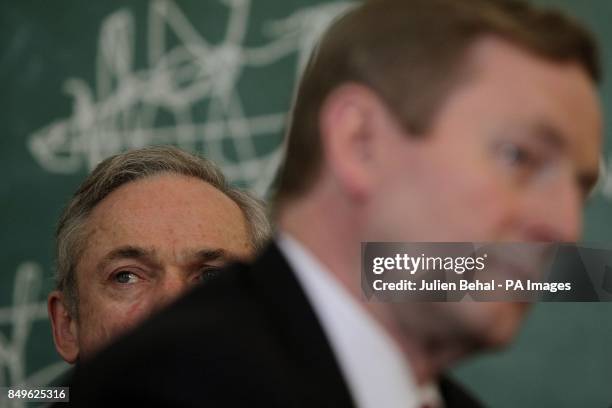 Minister for Jobs, Enterprise and Employment Richard Bruto and Taoiseach Enda Kenny at the Merrion Hotel in Dublin for the press conference to...