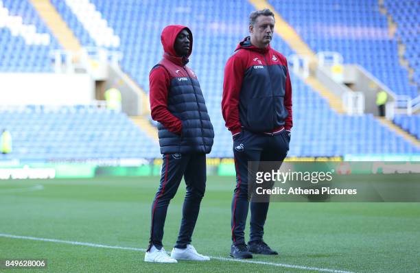 Swansea City assistant manager Claude Makelele and Swansea City goalkeeper coach Tony Roberts prior to kick off during the Carabao Cup Third Round...