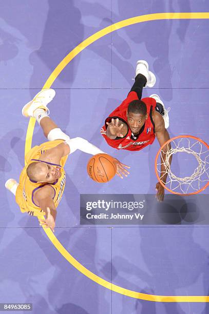 Duane Erwin of the Los Angeles D-Fenders has his shot challenged by Kurt Looby of the Rio Grande Valley Viper at Staples Center on February 20, 2009...