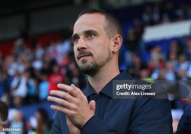 Mark Sampson the manager of England looks on during the FIFA Women's World Cup Qualifier between England and Russia at Prenton Park on September 19,...