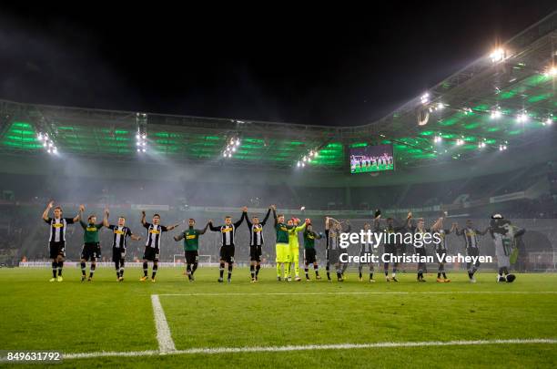 The Team of Borussia Moenchengladbach celebrates with the Fans after the Bundesliga match between Borussia Moenchengladbach and VfB Stuttgart at...