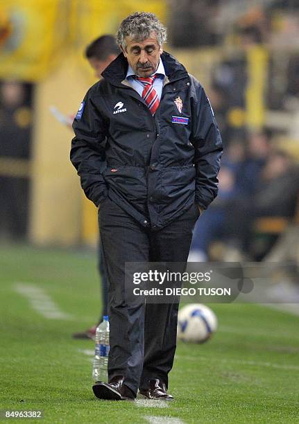 Sporting Gijon's coach Manuel Preciado reacts during a Spanish league football match against Villareal at the Madrigal Stadium in Villarreal on...