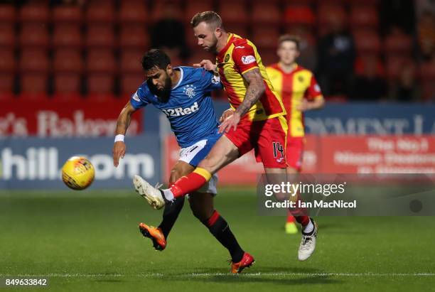 Candeias of Rangers vies with Christie Elliott of Partick Thistle during the Betfred League Cup Quarter Final at Firhill Stadium on September 19,...