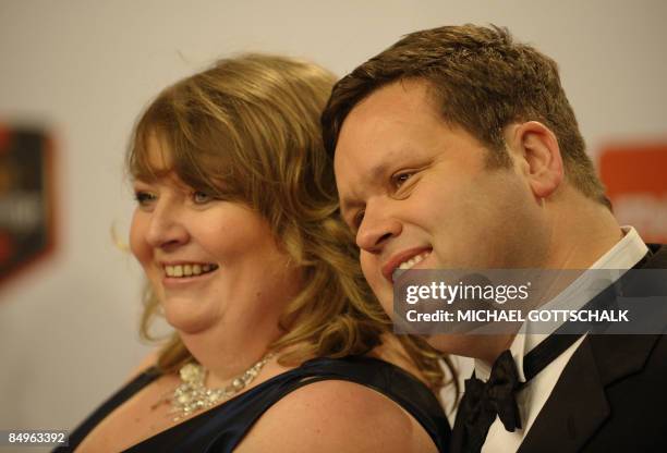 British tenor Paul Potts and his wife Julie-Ann pose on the red carpet of the Echo music awards in Berlin on February 21, 2009 in Berlin. The prize...