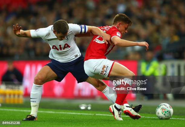 Jan Vertonghen of Tottenham Hotspur and Harvey Barnes of Barnsley battle for possession during the Carabao Cup Third Round match between Tottenham...