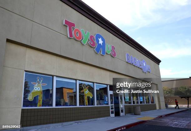 Pedestrian walks by a Toys R' Us store on September 19, 2017 in Pinole, California. Toys R' Us announced that it has filed for Chapter 11 bankruptcy....
