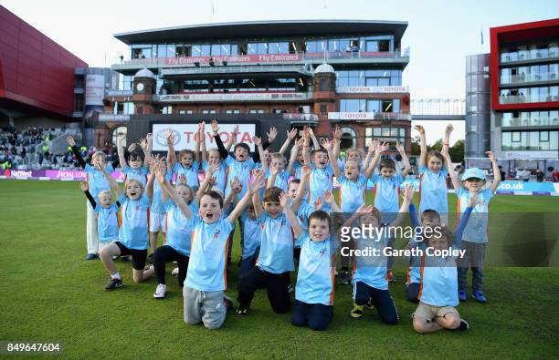 Children take part in All Stars Cricket during the 1st Royal London One Day International match between England and the West Indies at Old Trafford...