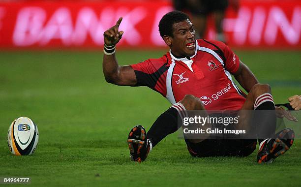 Ashwin Willemse celebrates after scoring his try during the round two Super 14 match between the Sharks and the Lions at ABSA Stadium on February 21,...