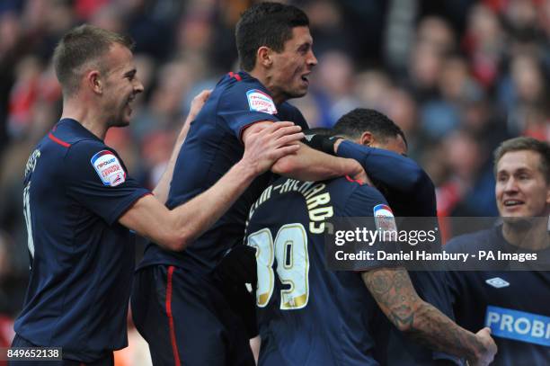 Blackburn's Colin Kazim-Richards celebrates with team mates after scoring the first goal during the FA Cup fifth round match at The Emirates Stadium,...