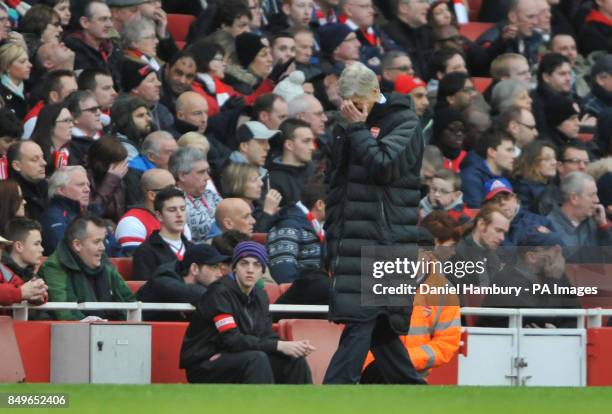 Arsenal manager Arsene Wenger shows his dejection during the FA Cup fifth round match at The Emirates Stadium, London.