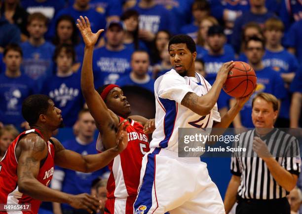 Markieff Morris of the Kansas Jayhawks posts up against Sek Henry of the Nebraska Cornhuskers during the game on February 21, 2009 at Allen...