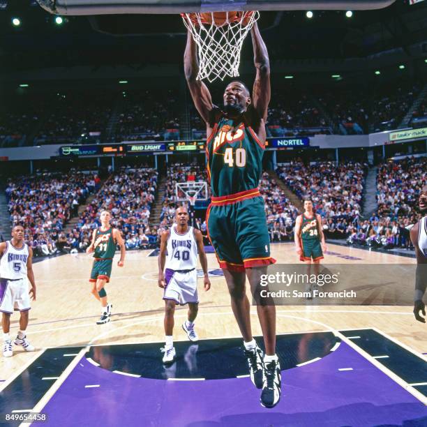 Shawn Kemp of the Seattle SuperSonics dunks circa 1996 at Arco Arena in Sacramento, California. NOTE TO USER: User expressly acknowledges and agrees...