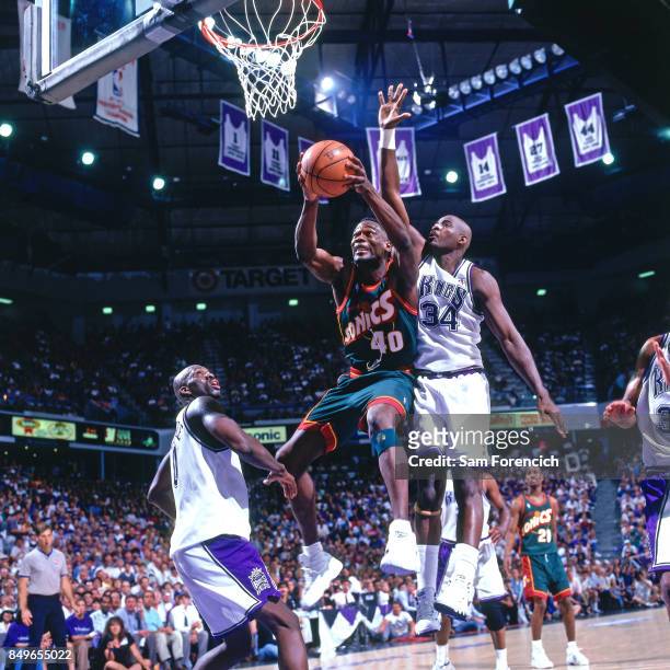 Shawn Kemp of the Seattle SuperSonics rebounds circa 1996 at Arco Arena in Sacramento, California. NOTE TO USER: User expressly acknowledges and...