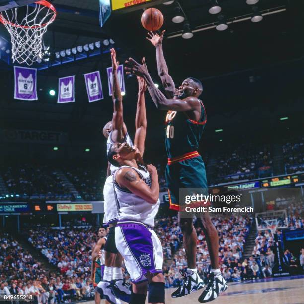 Shawn Kemp of the Seattle SuperSonics shoots circa 1996 at Arco Arena in Sacramento, California. NOTE TO USER: User expressly acknowledges and agrees...