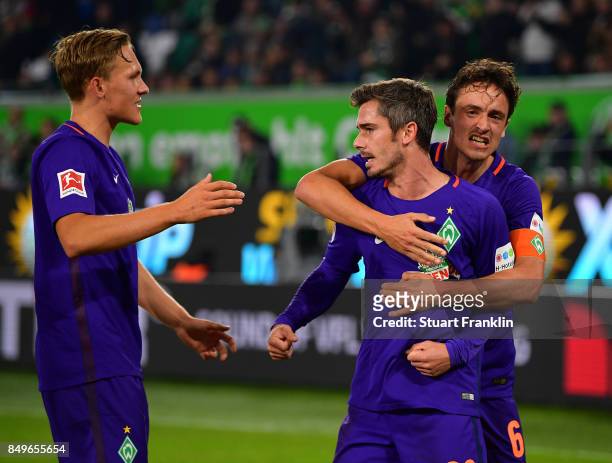 Fin Bartels of Bremen celebrates scoring his goal with Thomas Delaney during the Bundesliga match between VfL Wolfsburg and SV Werder Bremen at...