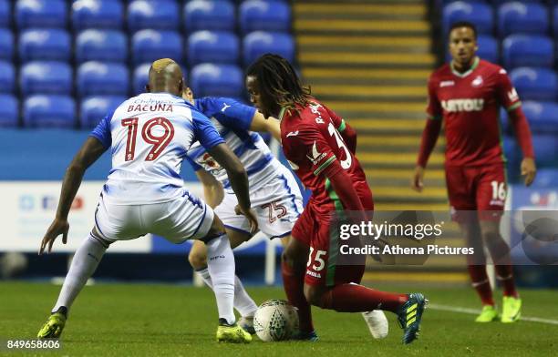 Renato Sanches of Swansea City is challenged by Leandro Bacuna of Reading during the Carabao Cup Third Round match between Reading and Swansea City...