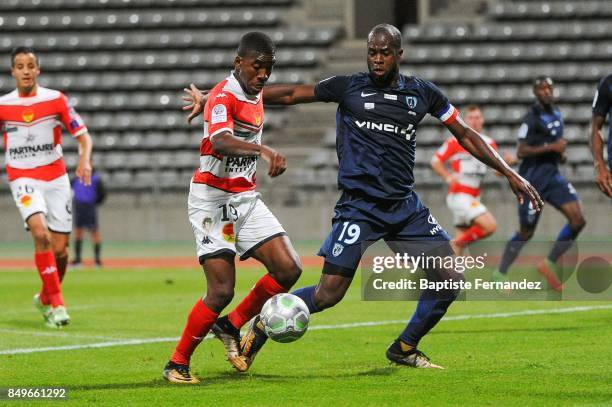 Ferris N'Goma of Orleans and Herve Lybohy of Paris FC during the French Ligue 2 mach between Paris FC and Orleans at Stade Charlety on September 19,...