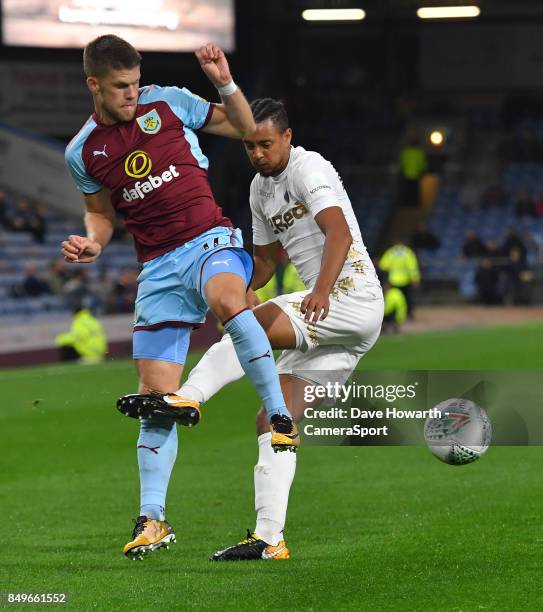 Burnley's Johann Guomundsson is fouled by Leeds United's Cameron Borthwick-Jackson during the Carabao Cup Third Round match between Burnley and Leeds...