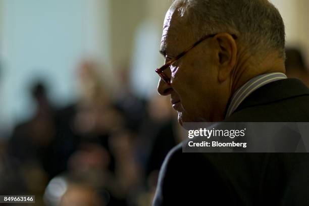 Senate Minority Leader Chuck Schumer, a Democrat from New York, listens during a news conference after a Democratic policy meeting luncheon at the...