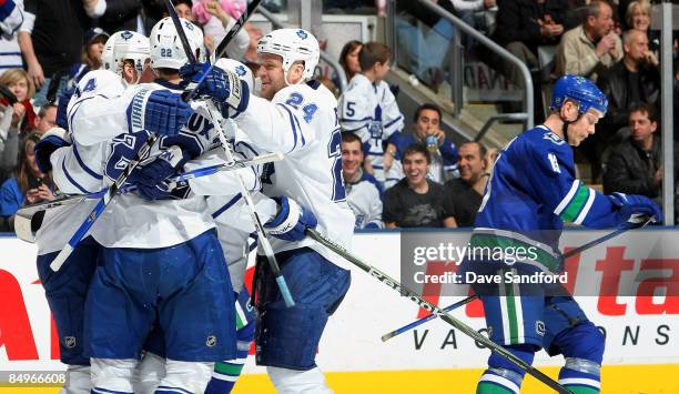 Mats Sundin of the Vancouver Canucks skates to the bench as Members of his former team the Toronto Maple Leafs celebrate a short handed 2nd period...